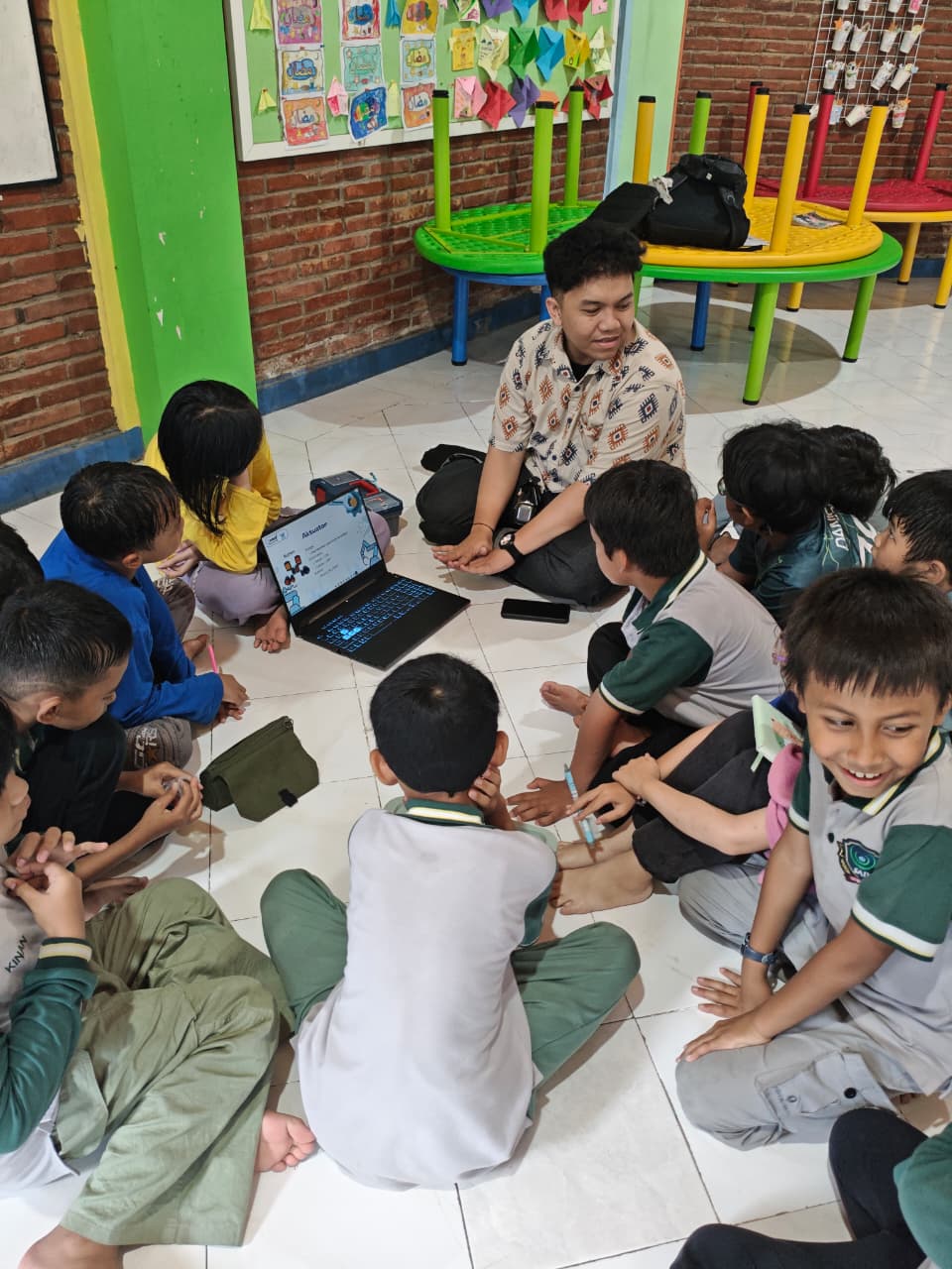 Teenagers aged 12–16 learning coding